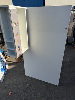 White ikea desk with baskets