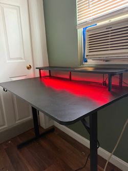 Gaming desk with LED lights charging port