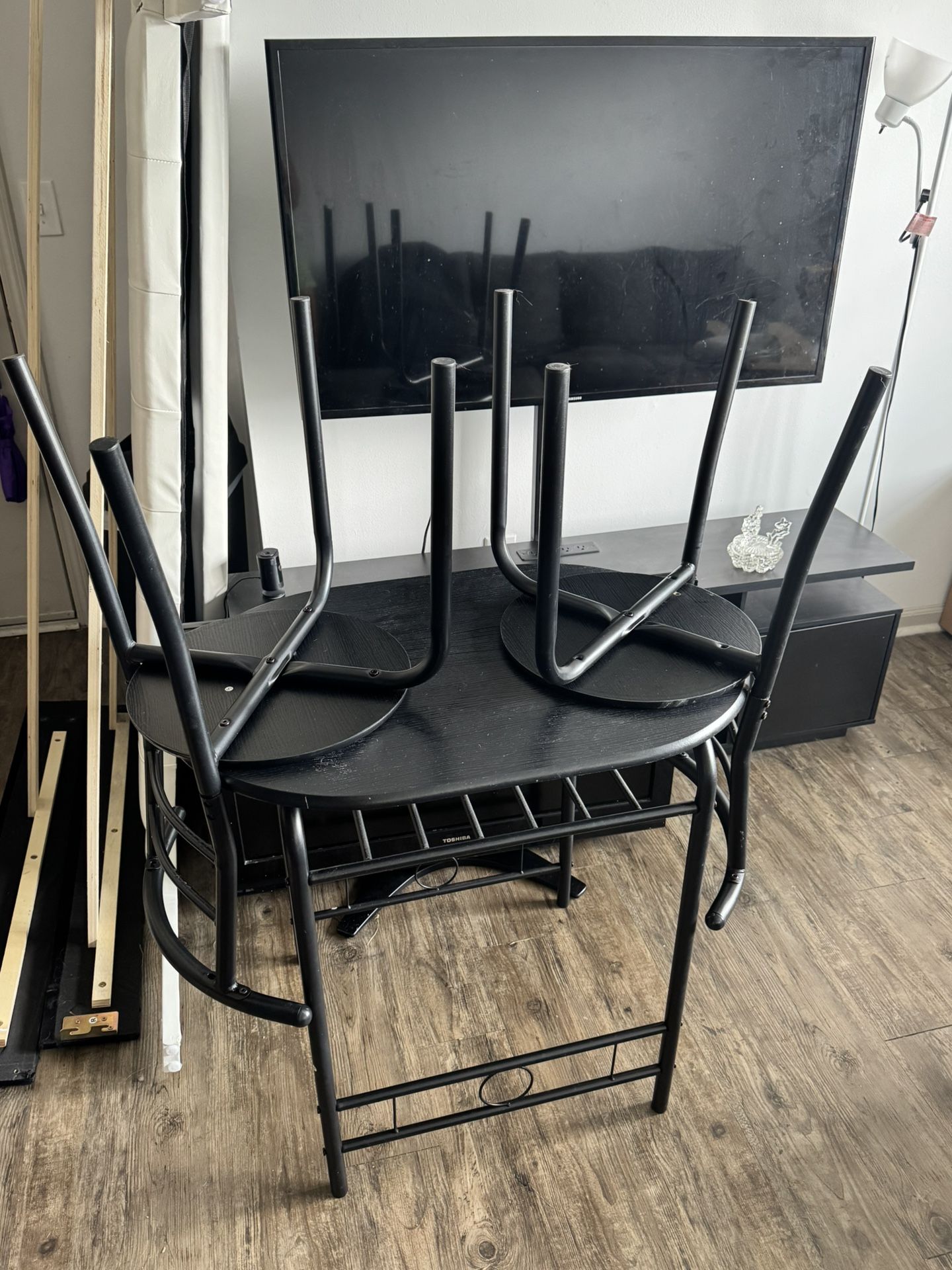 Black Small Table Two Black Chairs