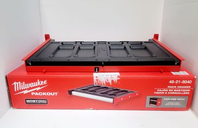 Milwaukee Packout rack drawer. This is the 48-21-8040 model. Great for organizing tools and small parts. Dimensions are about 21" wide, 2.75" high, an