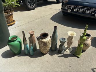 Assorted large vases.