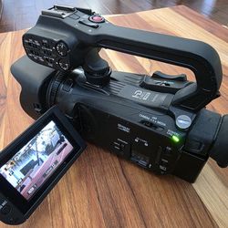 Canon XA11 Professional Camcorder Kit + Tripod + Charger – Excellent Condition