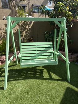 Small wooden swing