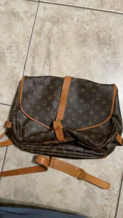 Louis Vuitton monogram brown tan crossbody bag with adjustable straps buckle