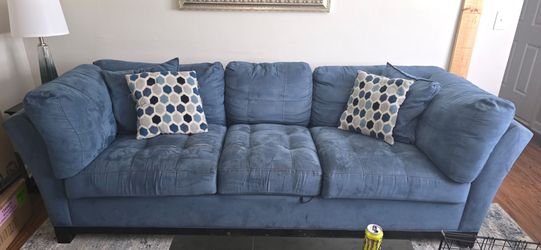 Blue sofa and green loveseat