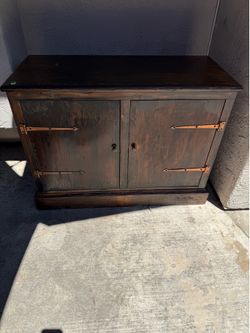 Wood stained cabinet