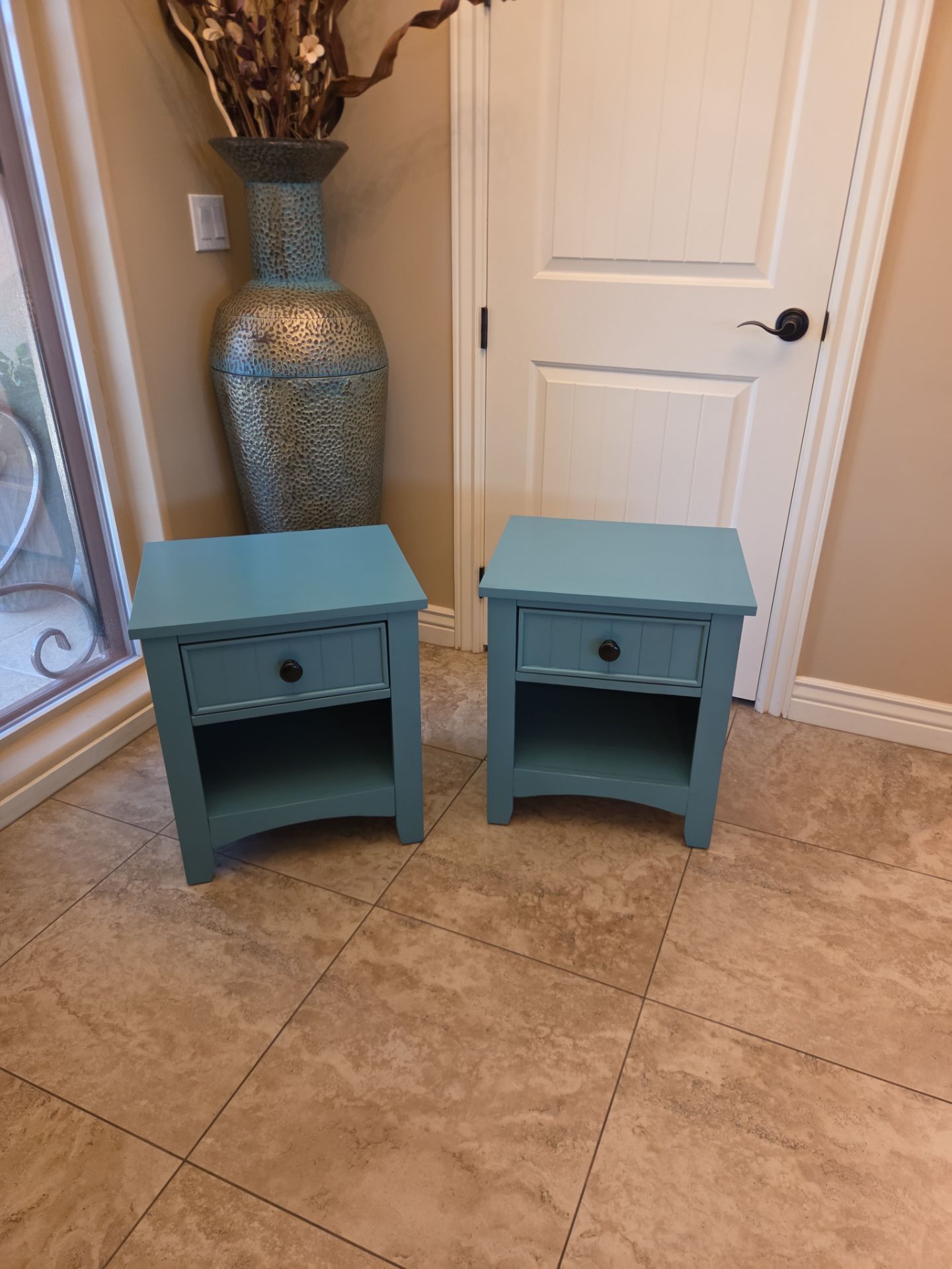 Pair of teal side tables with drawer.