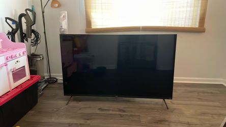 Large Flat Screen TV with Stand Legs