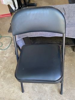 Folding padded chairs.