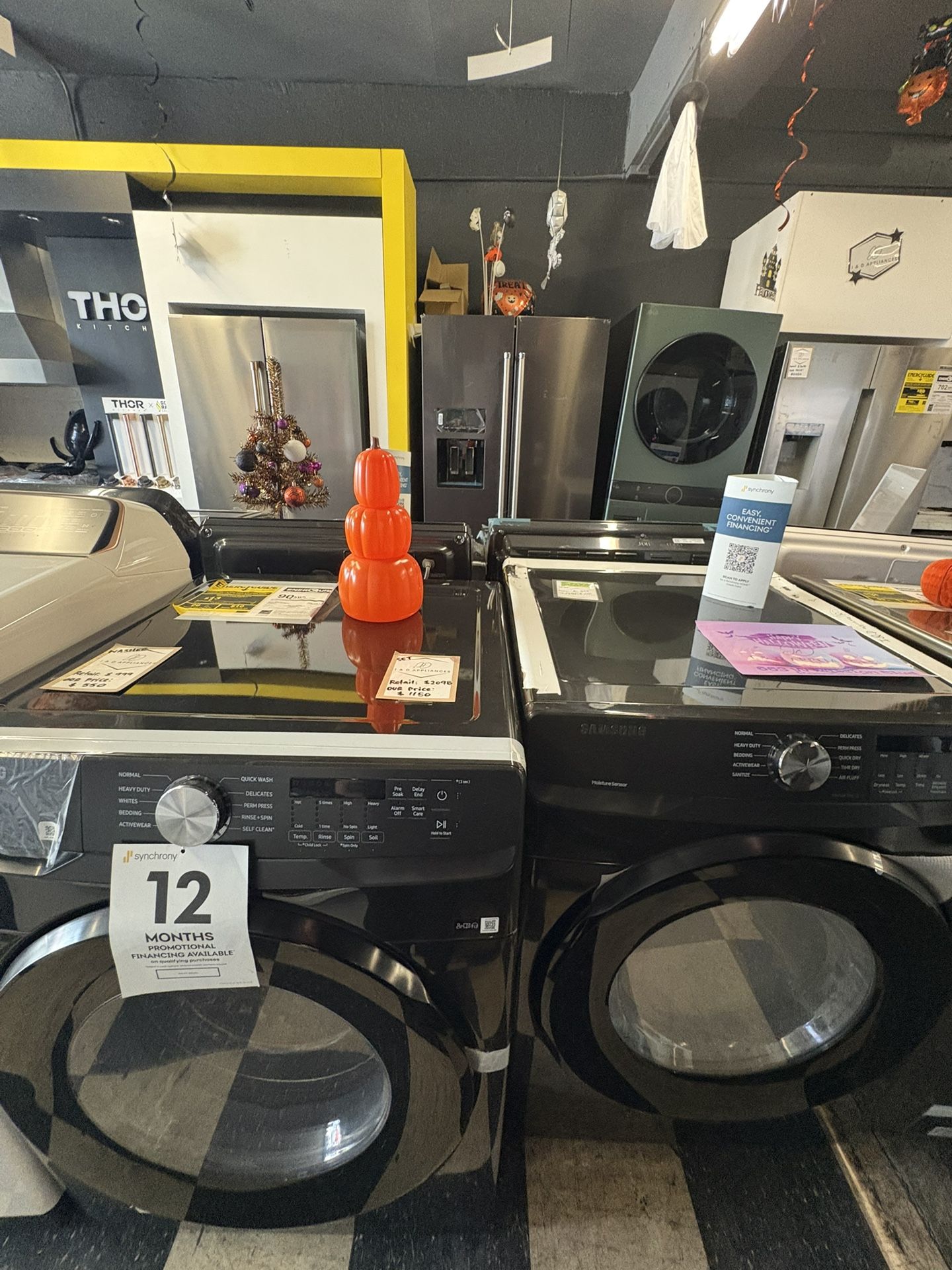 Samsung Top Load Washer and Gas Dryer In Black