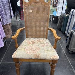 Vintage Cane-Back Armchair with Floral Cushion