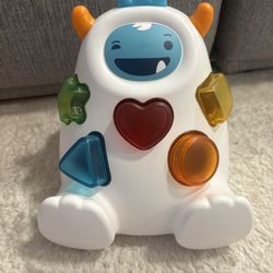 SKIP HOP EXPLORE & MORE SHAPE SORT & SPIN YETI TOY