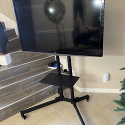 TV Plus Mobile Stand / Television Con Base Movible 