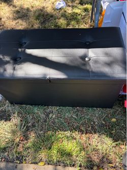 Black ottoman leather