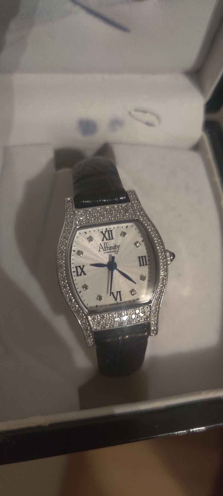 Affinity Diamonds Watch. Stainless Steel Case. Swiss Movement. Black Leather Band.