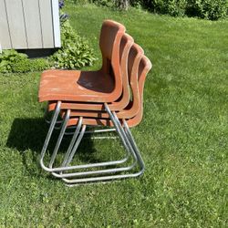 Lot Of 4 Orange Outdoor Stacking Chairs 