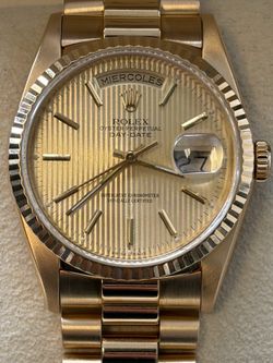 Rolex president day date