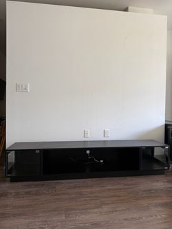 Black Low-Profile TV Stand with Glass Doors