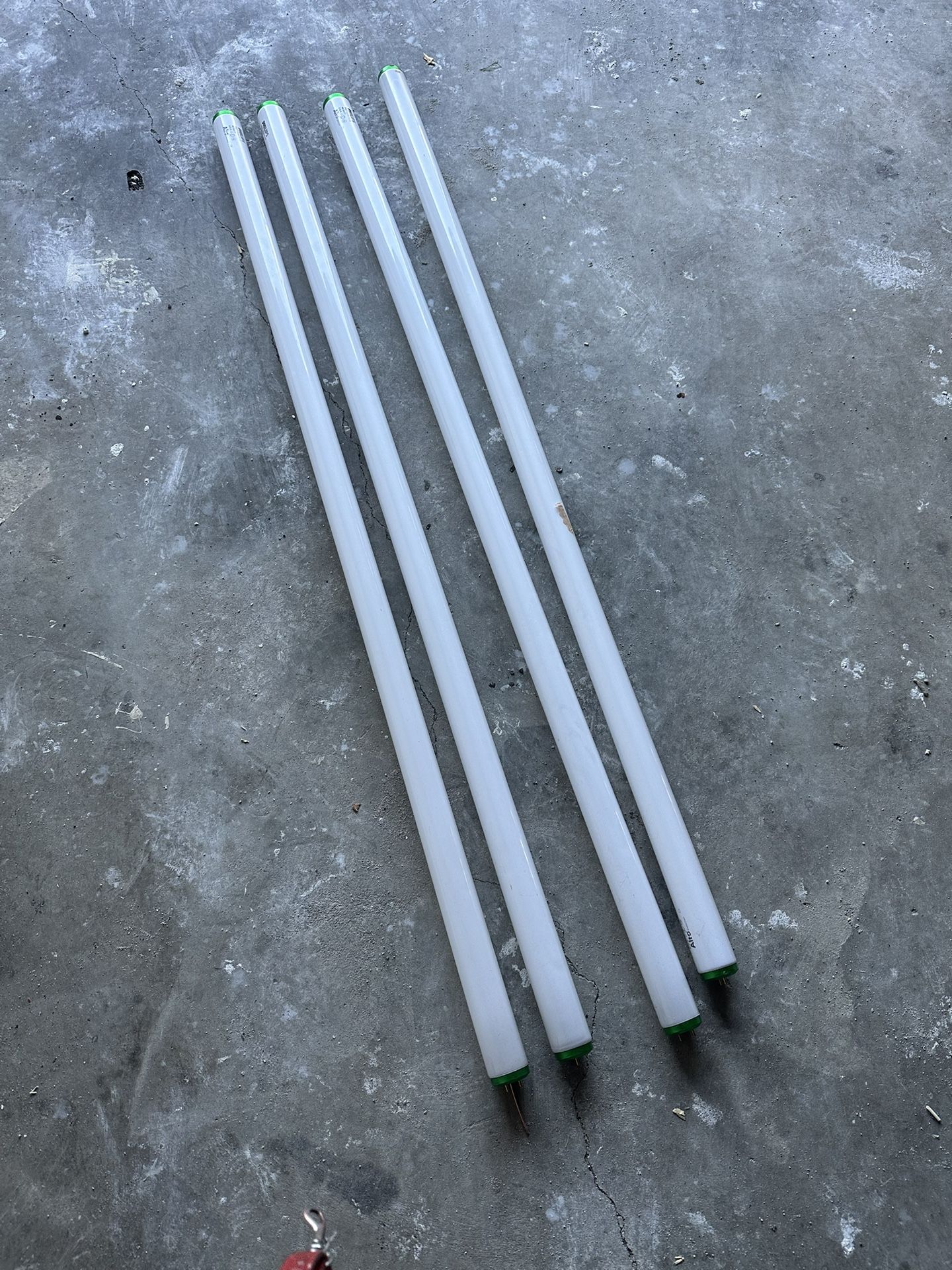 4 Florescent Light Tubs To Give Away Free. 47 Inches Long