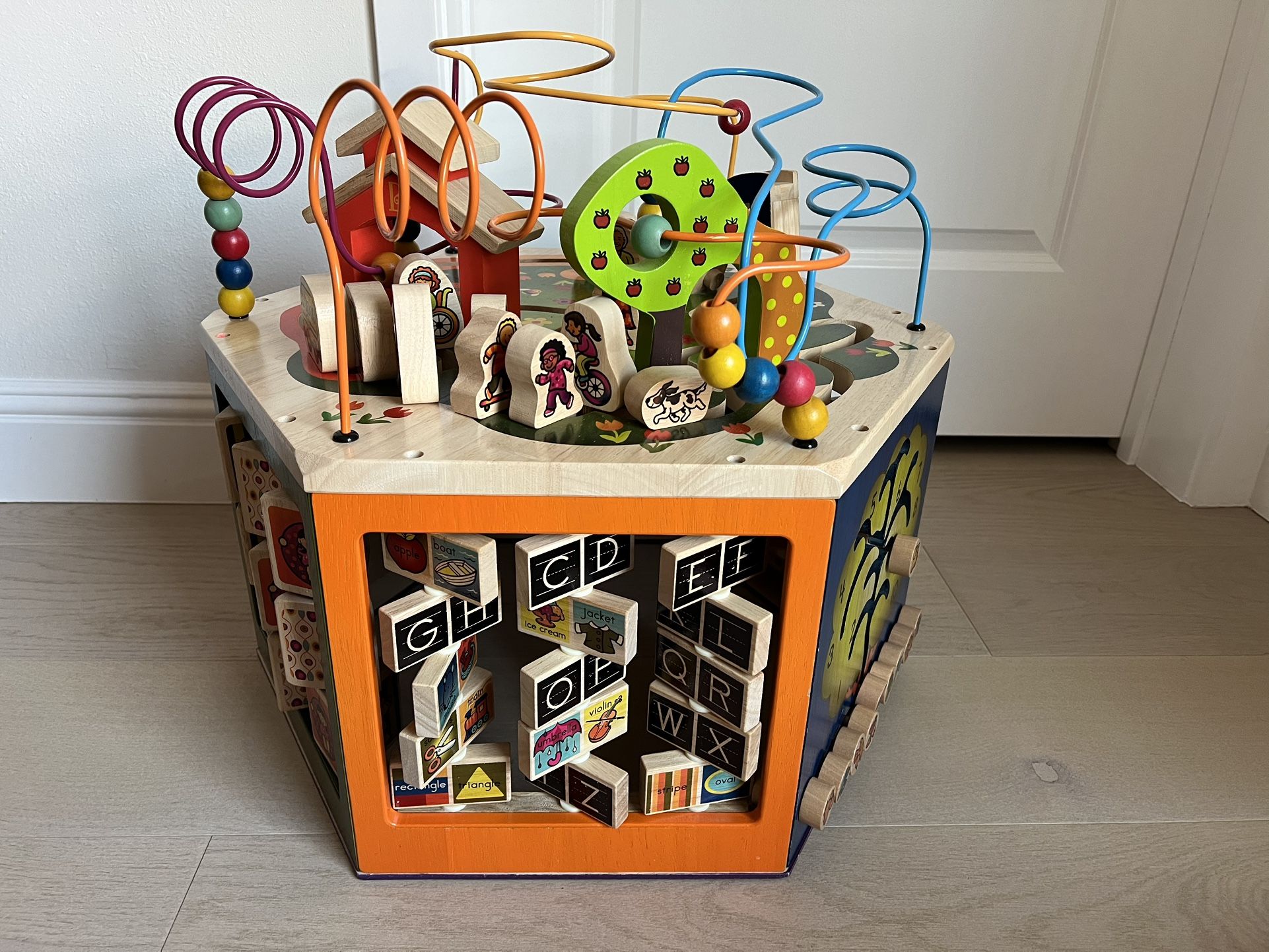 B. Toys Wooden Activity Cube - Youniversity