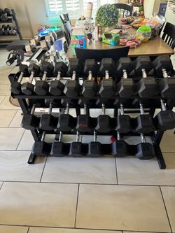 Rubber hex 10-65lbs plus rack 910lbs total