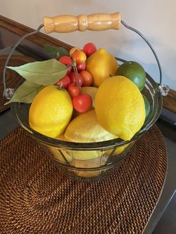 Glass Bucket full of lemons and limes