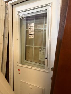 36 x 80 inch Outswing door with a pet Guard.