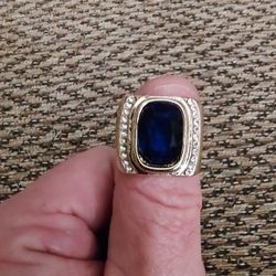 GOLD STAINLESS STEEL BLUE GEMSTONE, CZ RING. SIZE 10. NEW. PICKUP ONLY