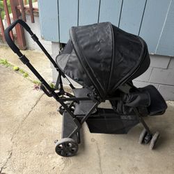 Baby stroller.