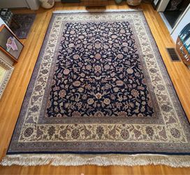 Beautiful 8’ × 10’ Persian-style woven area rug featuring an intricate allover floral vine pattern