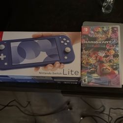 Nintendo Switch Lite Blue With Mario Kart 8 Unopened 