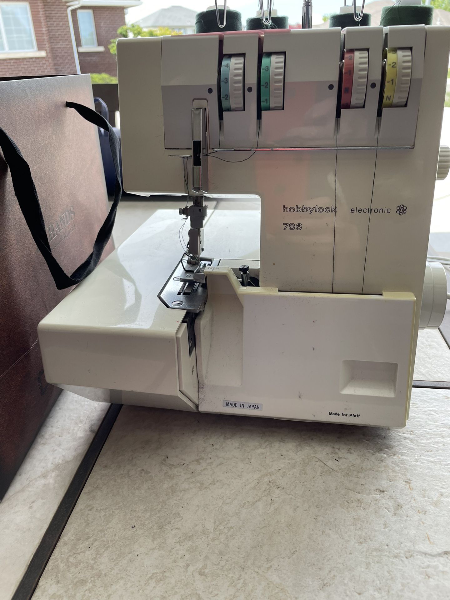 Serger With Threads And Carrying Case