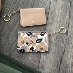Two Small Wallets Hand 