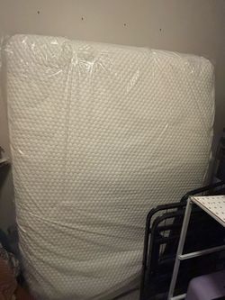 Full size mattress with basic metal frame