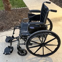 Wheelchair With Footrests 