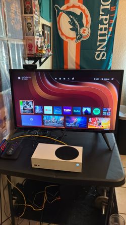 Xbox series s with Roku tv and controller charging station
