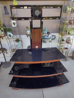 Tv. Stand metal. And. Glass shelf.   $30