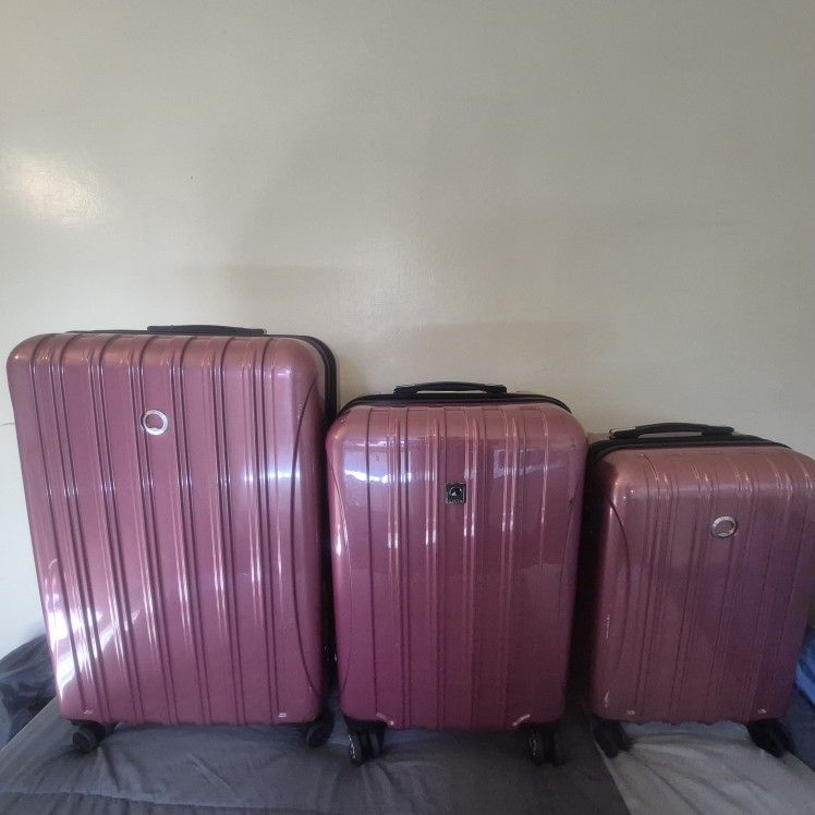 3 Piece Delsey Paris Rolling Hard Luggage Case
