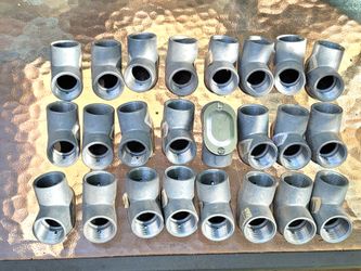Lot of 27 pieces of 3/4-inch 90-degree Rigid-to-Rigid Threaded Pull Elbow