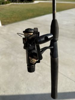 Shimano FX200 spinner on 6’ Shakespeare rod #22