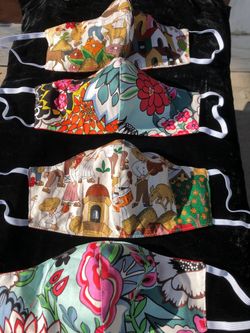 New professionally made with pride in the United States. Nose and mouth covers. Cotton material.