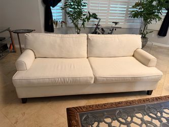 Living Spaces Cream Fabric Sofa (fits 4 people)