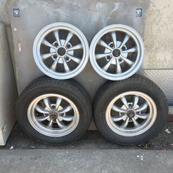 Set of Four Silver Spoke Empi Eight Spoke Style VW Wheels and Two Good Tires
