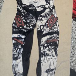 Older Used Black And White Dirt Bike Pants- O'Neal 