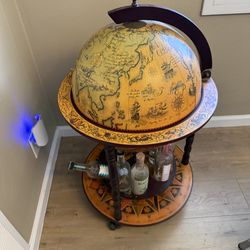 Globe antique bar / bottle holder