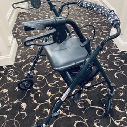 Medline Basic Steel Rollator Walker in black.