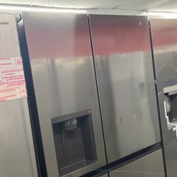 New Scratch And Dent LG 27.2 Cu Ft Stainless Steel Side By Side Fridge. 1 Year Warranty 