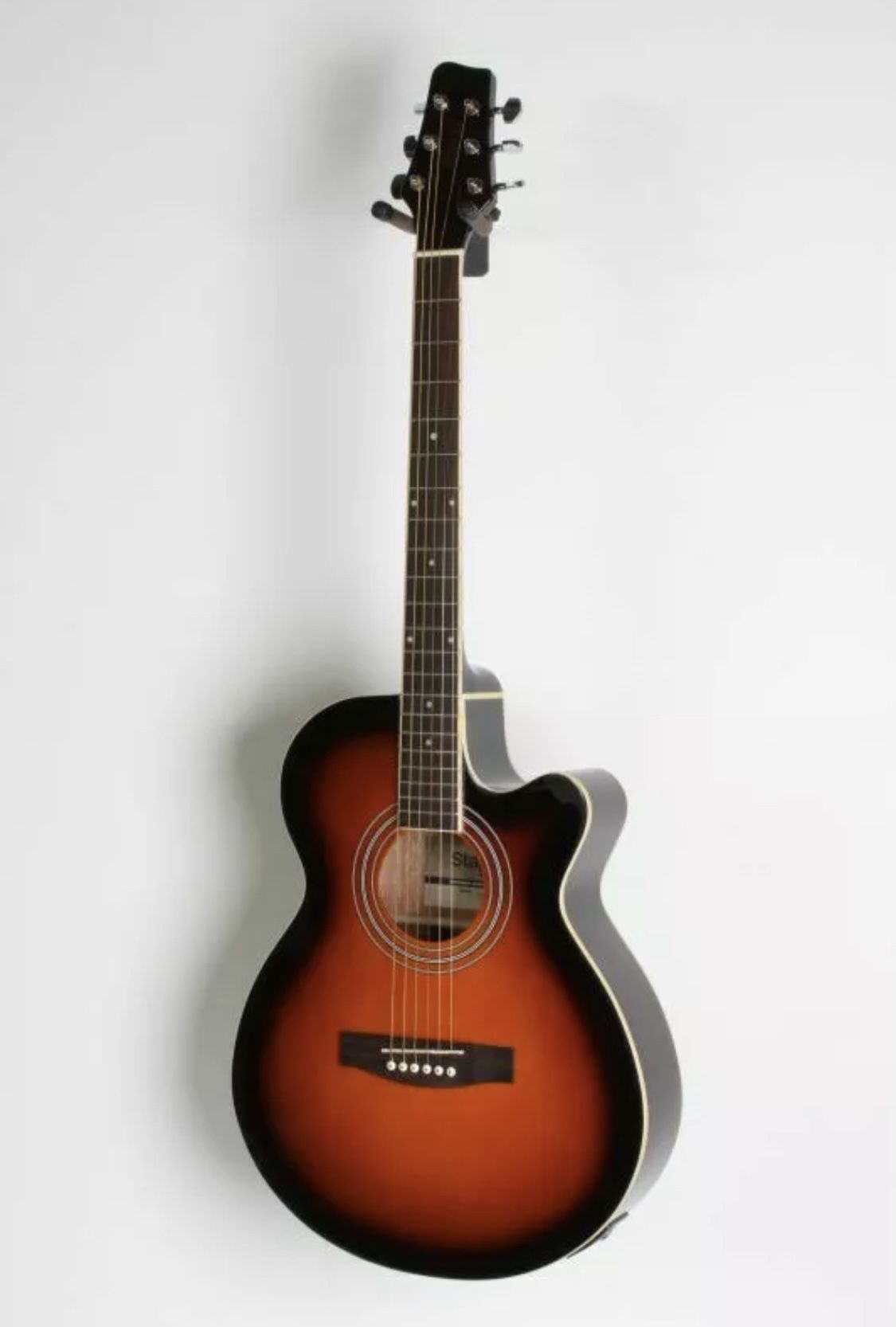 This Stagg Mini-Jumbo Electric-Acoustic Cutaway Concert Guitar is a great choice for the aspiring guitarist. The convenient cutaway gives you better