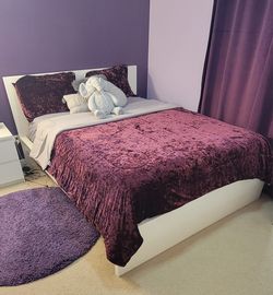 Beautiful white queen size bed with mattress and 1 side table and a large dresser mirror. (MUST SELL TODAY)