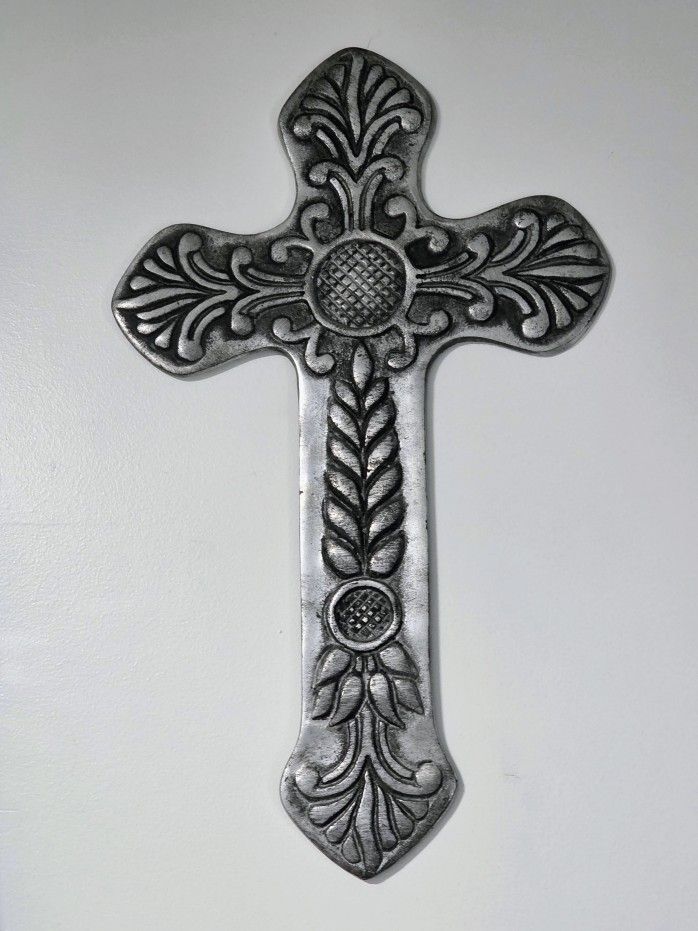 Beautiful single-forged metal cross with raised detailing measuring 18 1/2L x 11W". Vintage. Mexico.